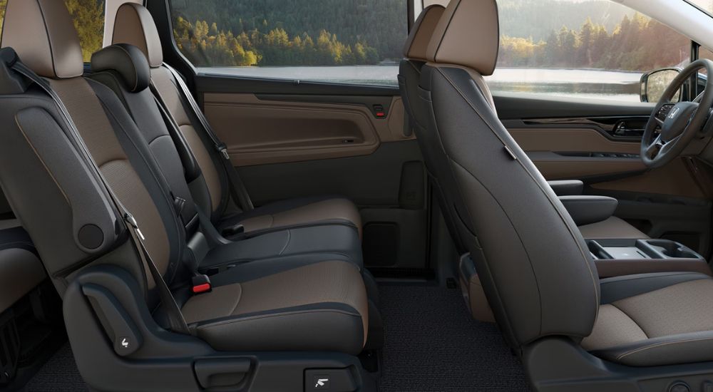 Brown leather seats in a 2027 Honda Odyssey Elite.