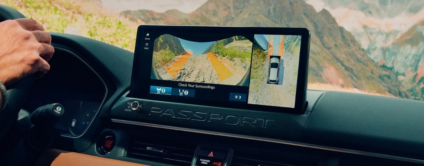 Infotainment display of a 2026 Honda Passport Elite TrailSport showing surround view cameras.