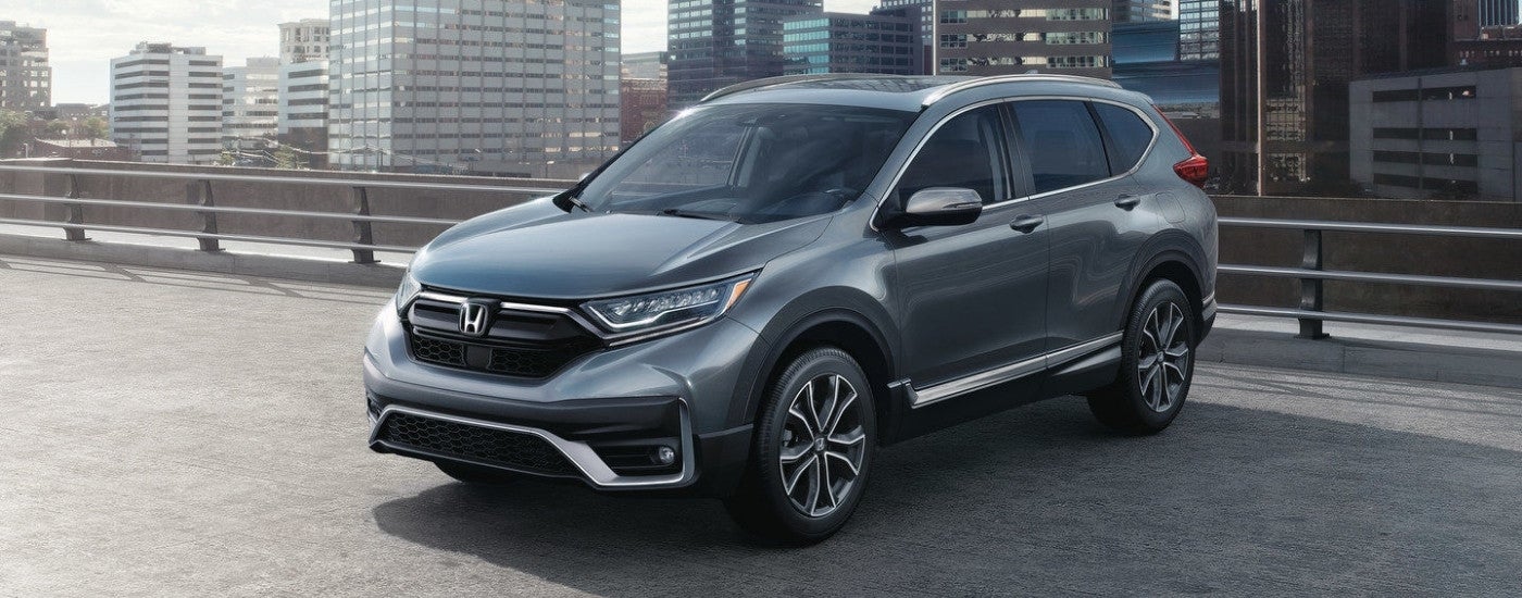 Grey 2020 Honda CR-V parked in front of a city