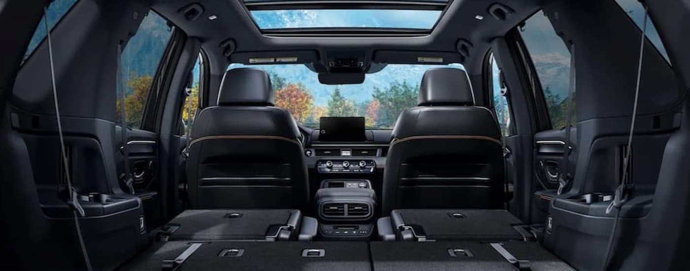 Black interior and dash in a 2025 Honda Pilot.