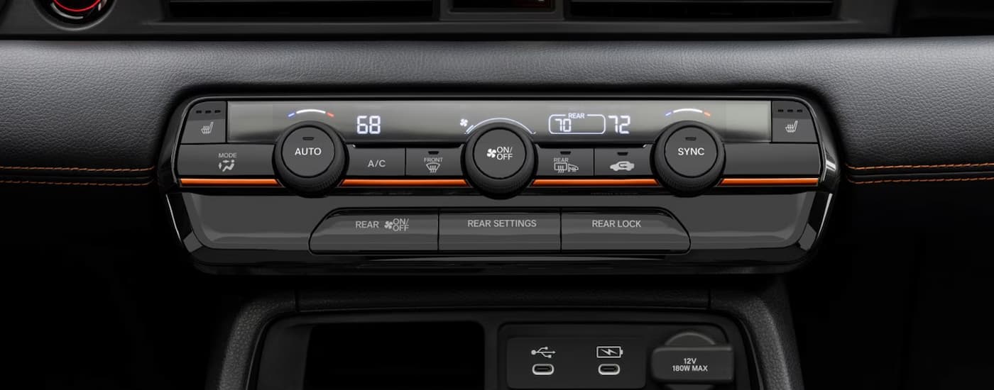 Buttons in the center console of a 2026 Honda Pilot for sale